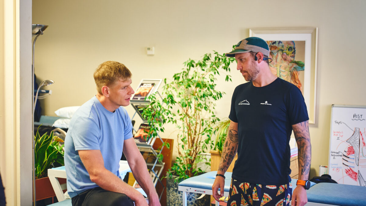 Two men in a biomechanics workshop setting