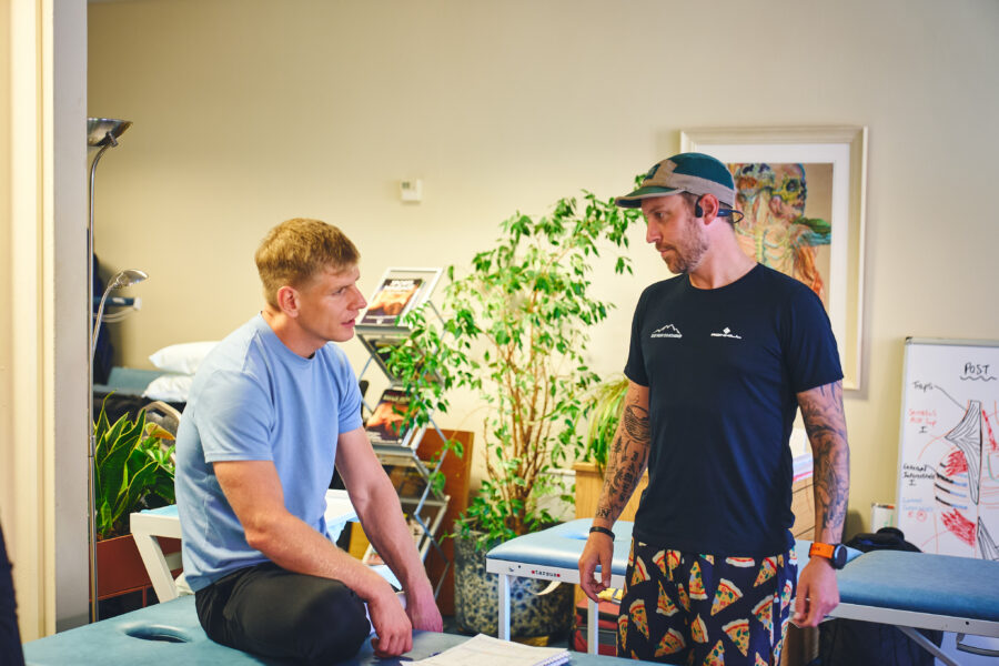 Two men in a biomechanics workshop setting